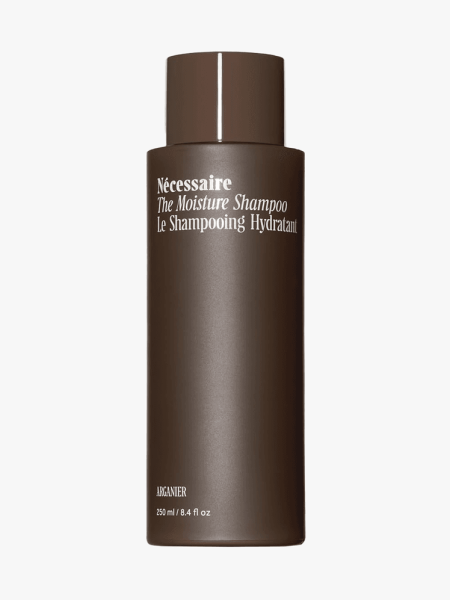 Nécessaire The Moisture Shampoo in branded component on a light gray background
